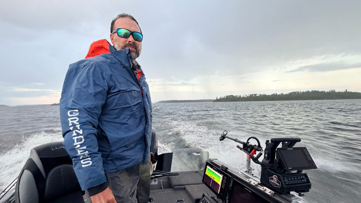 Load video: Brad Kolstad demonstrating Fish Armor boat mounting systems including Pro Pole Boat Mount Arm, Pro Pole, and docking plates for converting ice fishing shuttles to open water use