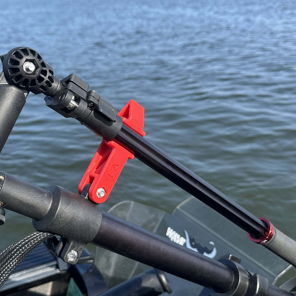Twist Handle closeup, stowed in the red directional arrow clip